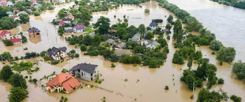 An overhead view of a heavily flooded neighborhood.